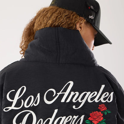 The model is wearing this MLB X Alpha LA Dodgers Jacket in black. 7