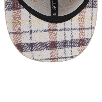 Pictured is this MLB Halloween LA Dodgers 59FIFTY Fitted cap in beige. 2