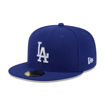 Pictured is this MLB Rhinestone Badge LA Dodgers 59FIFTY Fitted cap in dark blue. 1