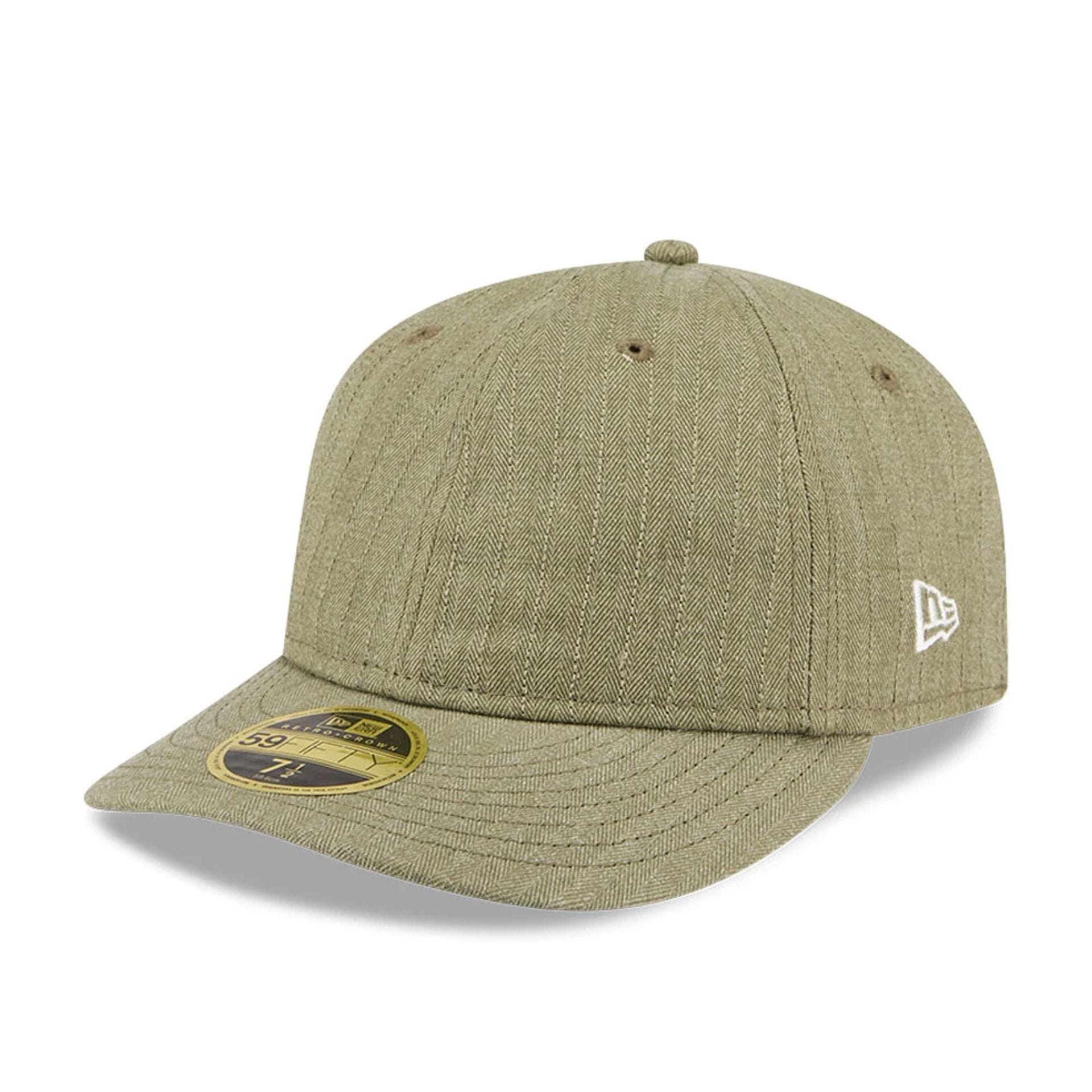 Pictured is this New Era Herringbone Retro Crown 59FIFTY Fitted cap in green. 1