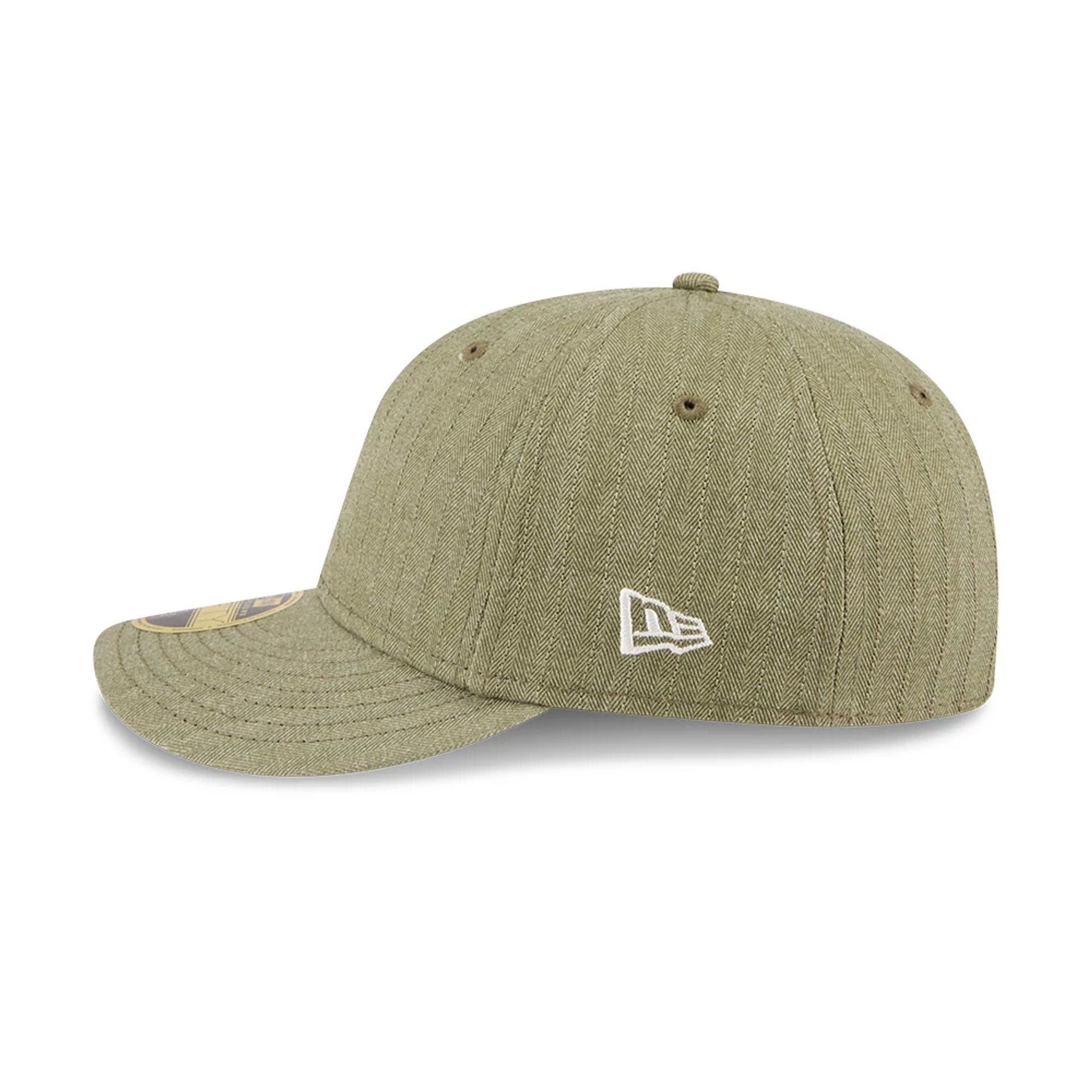 Pictured is this New Era Herringbone Retro Crown 59FIFTY Fitted cap in green. 5