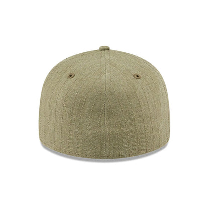 Pictured is this New Era Herringbone Retro Crown 59FIFTY Fitted cap in green. 7