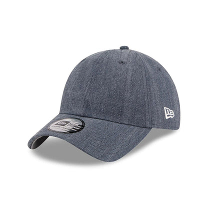 Pictured is this New Era Herringbone Pinstripe Casual Classic cap in navy. 1