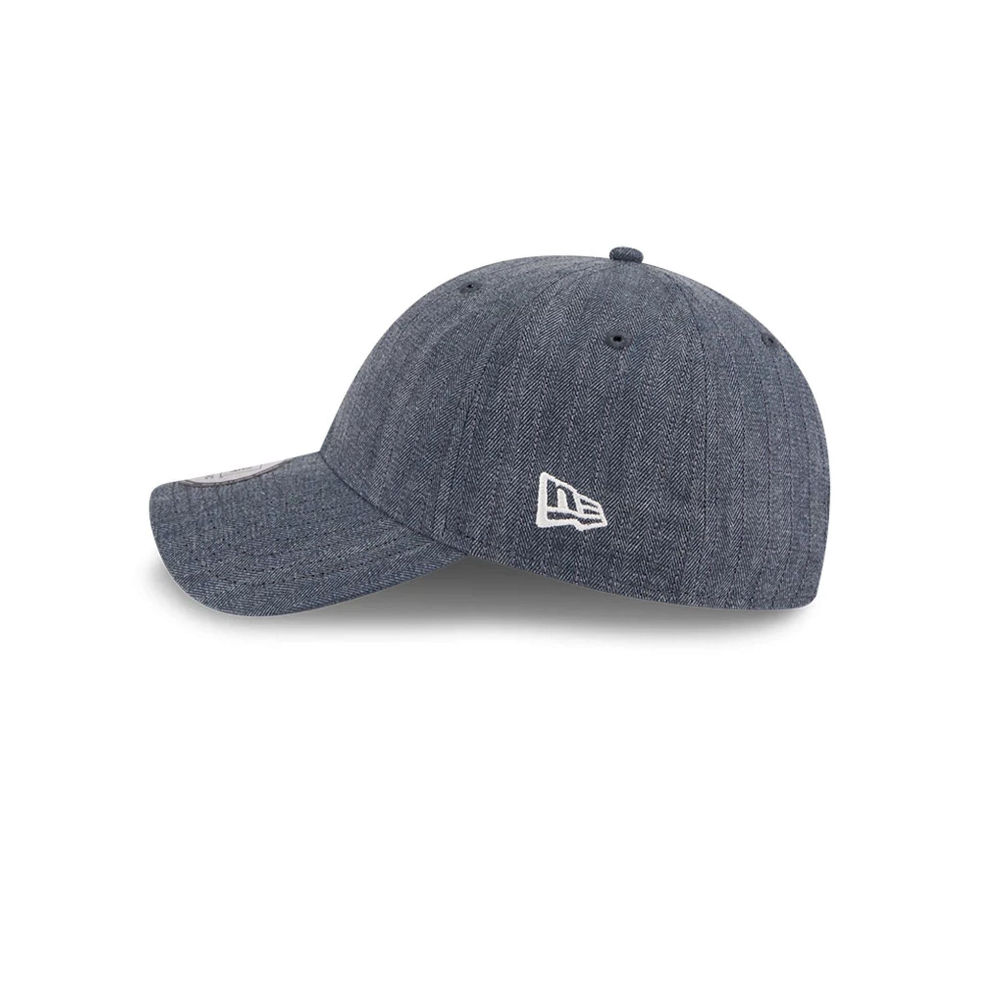 Pictured is this New Era Herringbone Pinstripe Casual Classic cap in navy. 6
