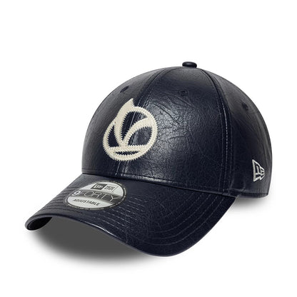 Vespa Crinkle PU Navy New Era 9FORTY Adjustable Cap, three-quarter view showing a large cream embroidered Vespa logo on the front panel, black crinkle-textured material, a New Era flag logo on the left side.