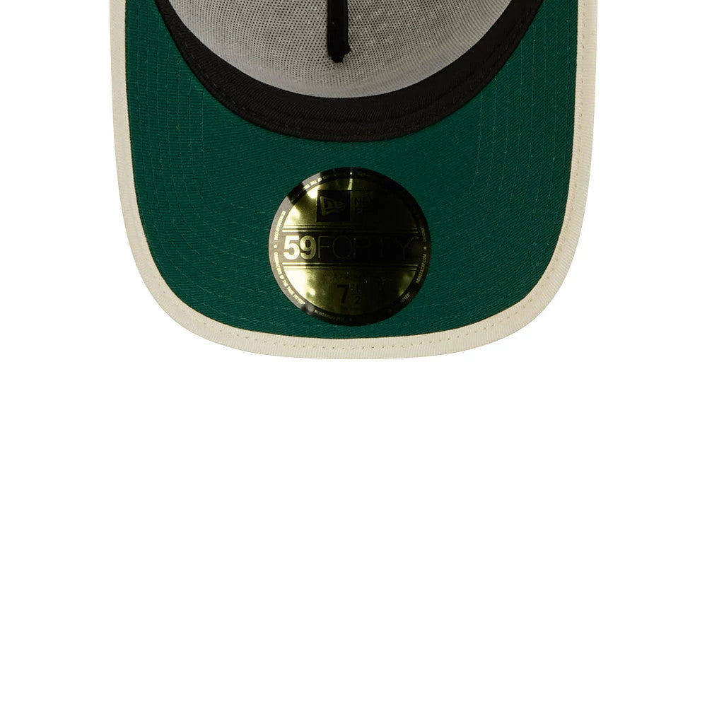 New Era Oval Patch Cream New Era 59FORTY A-Frame Fitted Cap, inside view showing the green undervisor with a gold 59FORTY size sticker, contrasting with the cream edge and the interior black taping.