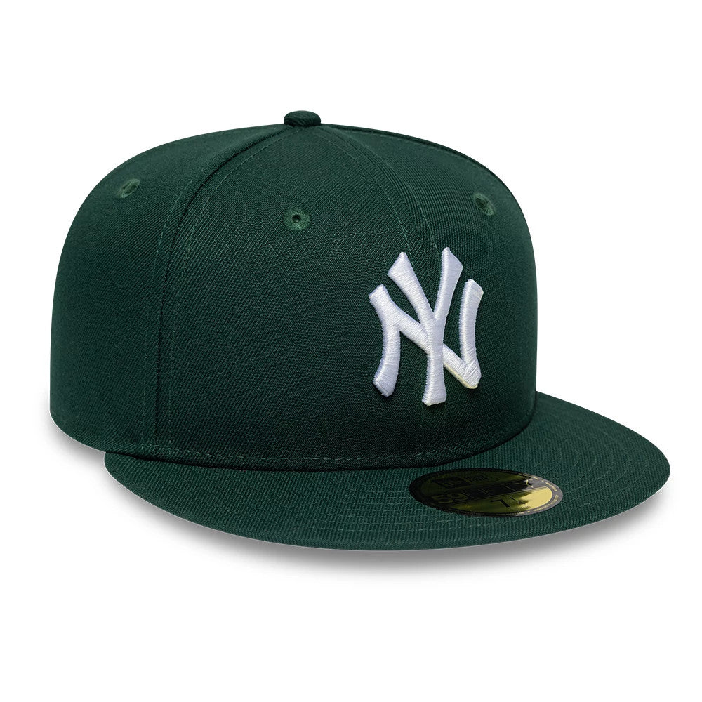 Pictured is this MLB League Essential New York Yankees 59FIFTY Fitted cap in dark green. 3