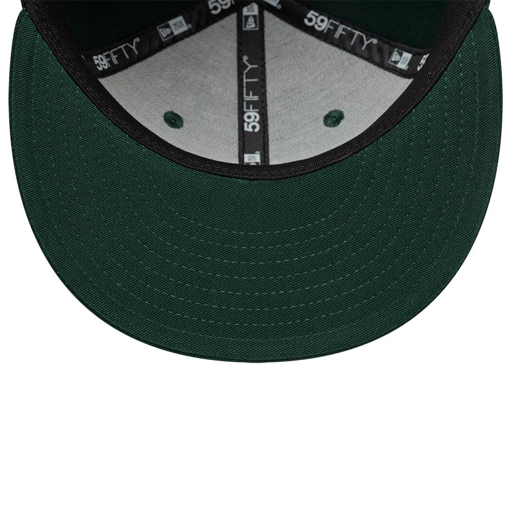 Pictured is this MLB League Essential New York Yankees 59FIFTY Fitted cap in dark green. 5