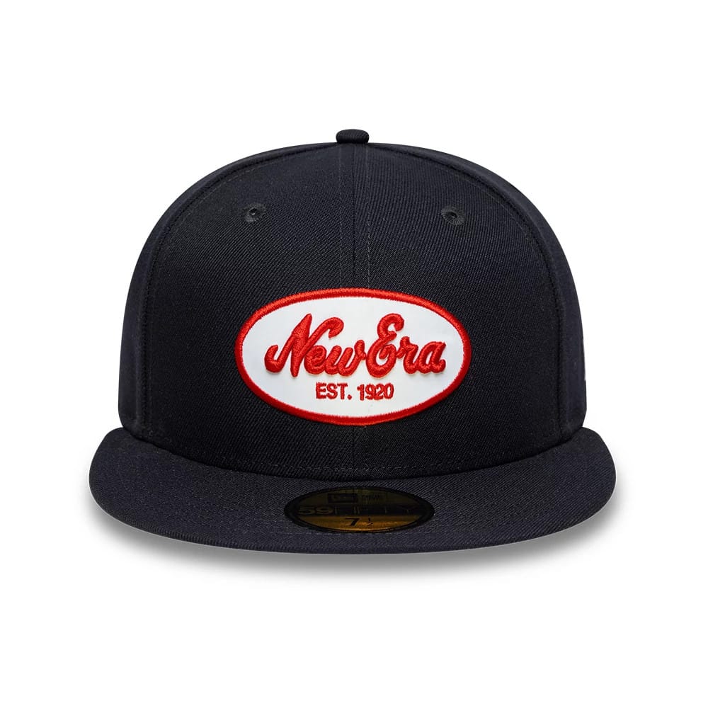 Pictured is this New Era Oval Patch 59FIFTY Fitted cap in navy. 2