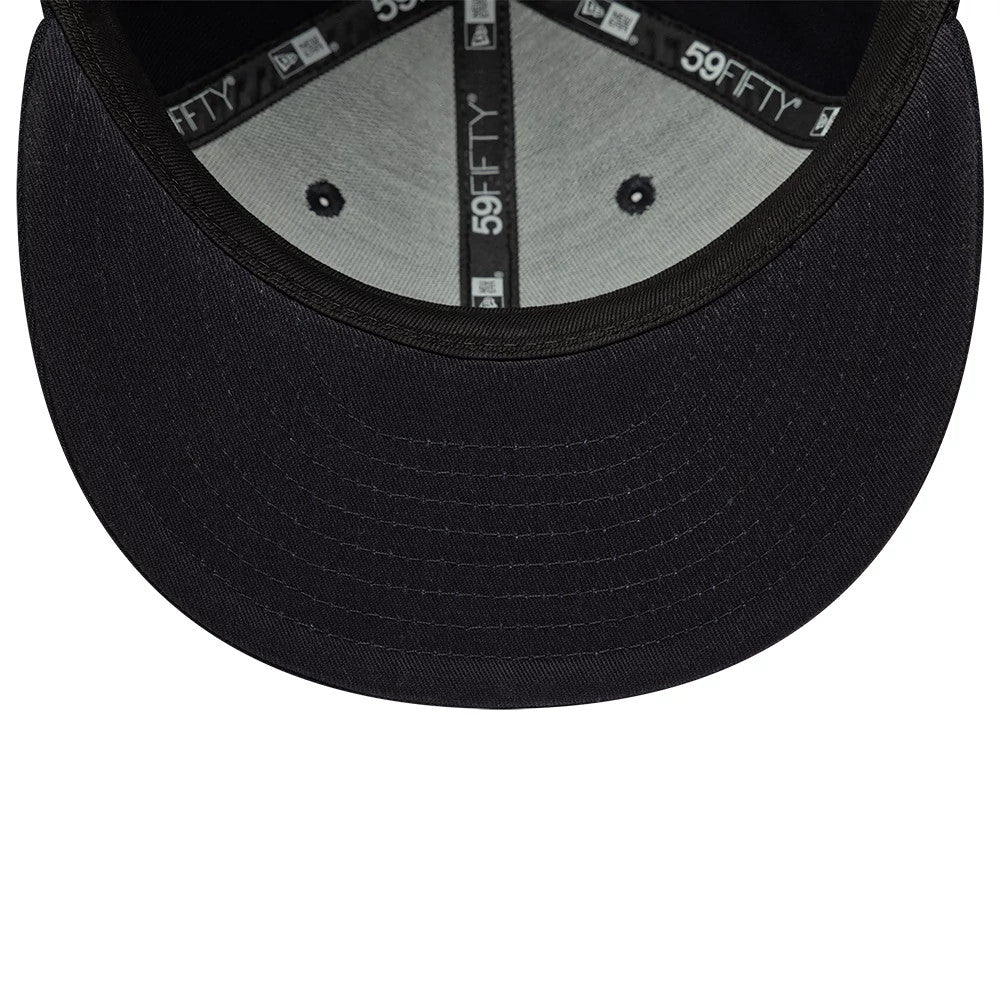 Pictured is this New Era Oval Patch 59FIFTY Fitted cap in navy. 5