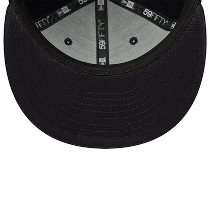 Pictured is this New Era Oval Patch 59FIFTY Fitted cap in navy. 5