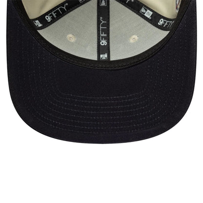 Pictured is this MLB World Series Patch New York Yankees 9FIFTY Snapback Adjustable cap in light beige. 5