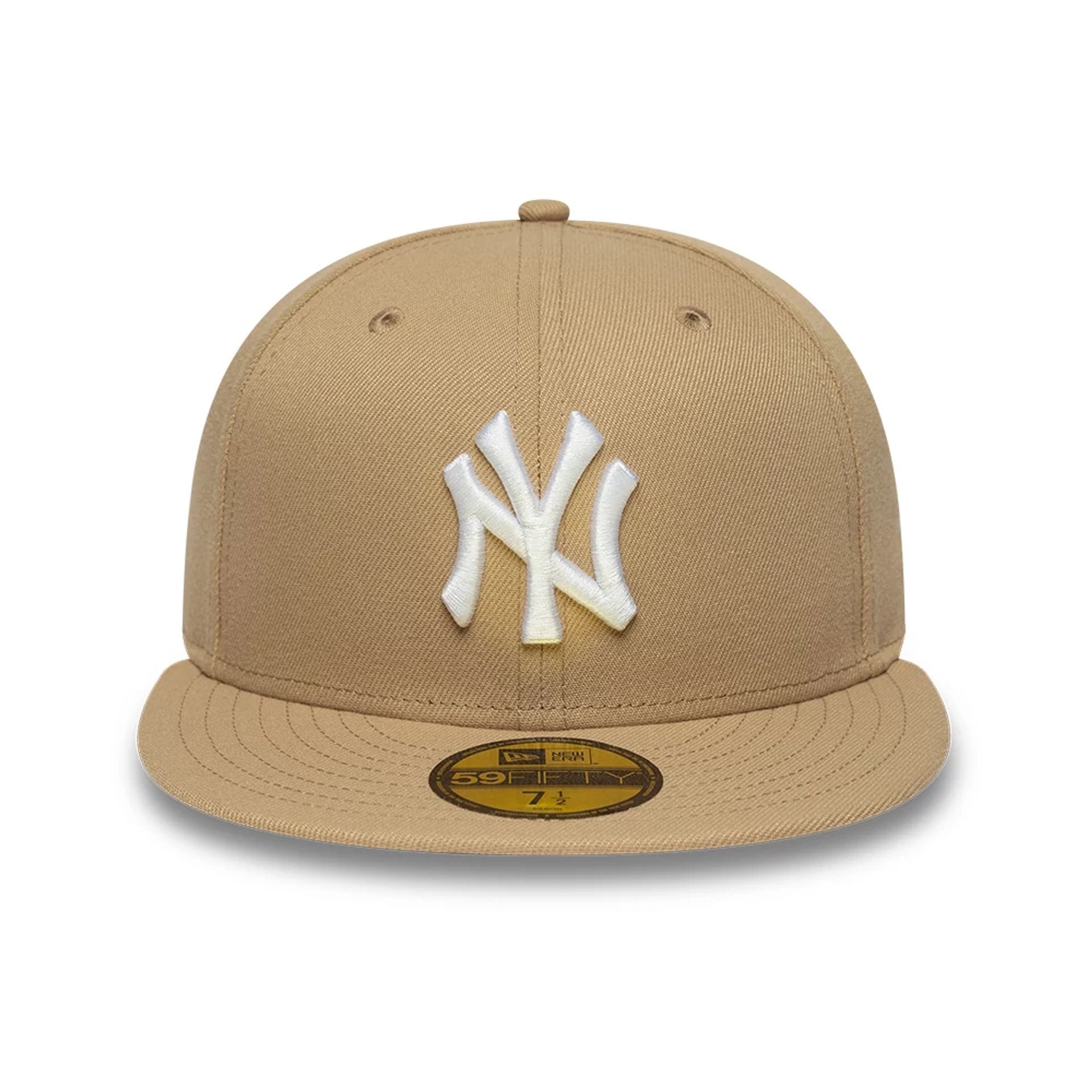 Pictured is this MLB League Essential New York Yankees 59FIFTY Fitted cap in light beige. 2