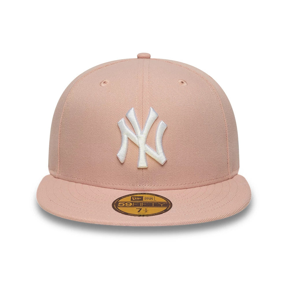 New York Yankees MLB League Essential Pastel Pink New Era 59FIFTY Fitted Cap, front view showing the white raised embroidered NY logo on the structured pastel pink crown, with a matching pastel pink flat visor.