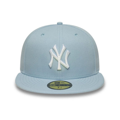 Pictured is this MLB League Essential New York Yankees 59FIFTY Fitted cap in pastel blue. 2