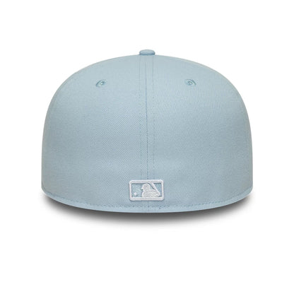 Pictured is this MLB League Essential New York Yankees 59FIFTY Fitted cap in pastel blue. 4