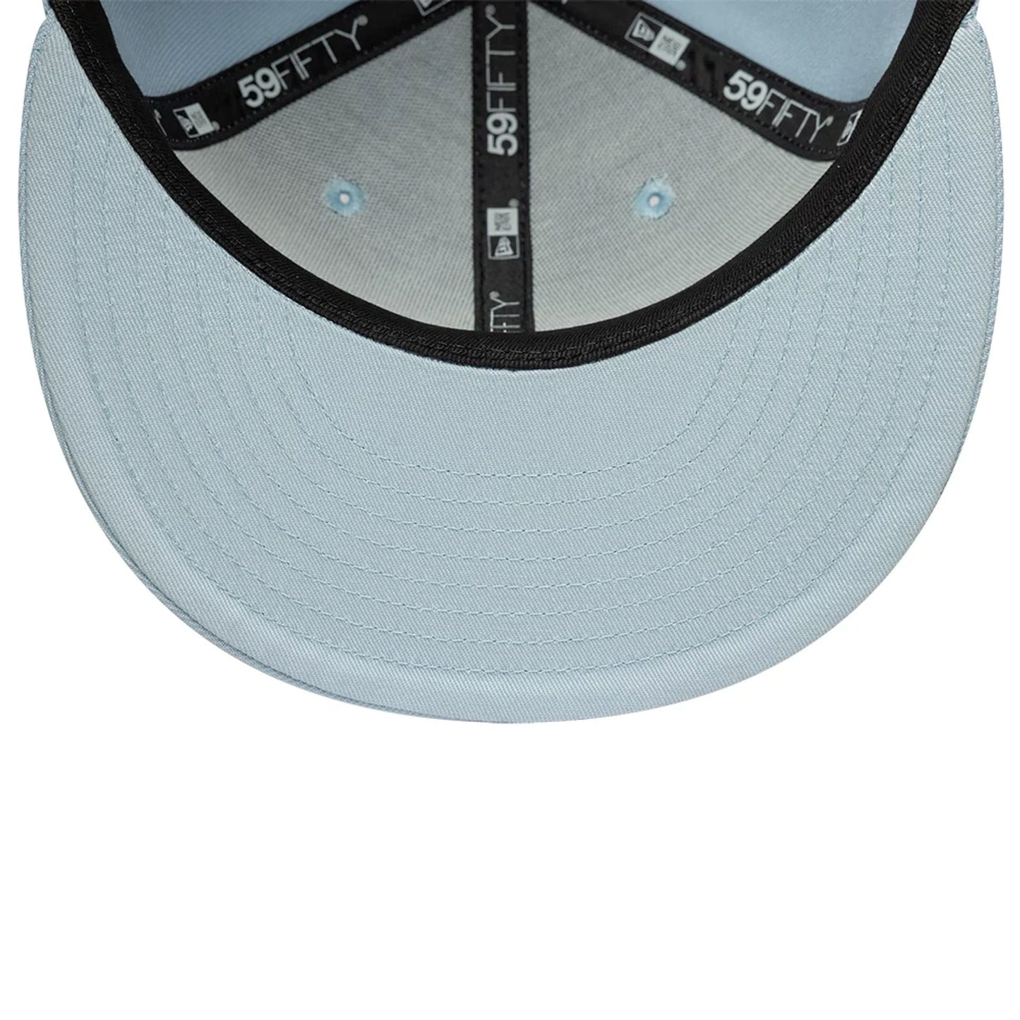 Pictured is this MLB League Essential New York Yankees 59FIFTY Fitted cap in pastel blue. 5