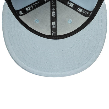 Pictured is this MLB League Essential New York Yankees 59FIFTY Fitted cap in pastel blue. 5