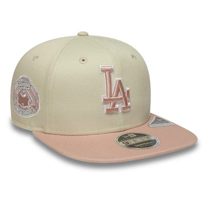 Pictured is this MLB World Series Patch LA Dodgers 9FIFTY Snapback Adjustable cap in light beige. 1