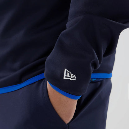 The model is wearing this Atlassian Williams F1 Team Mid Layer 1/4 Zip Long Sleeve T-Shirt in navy. 7