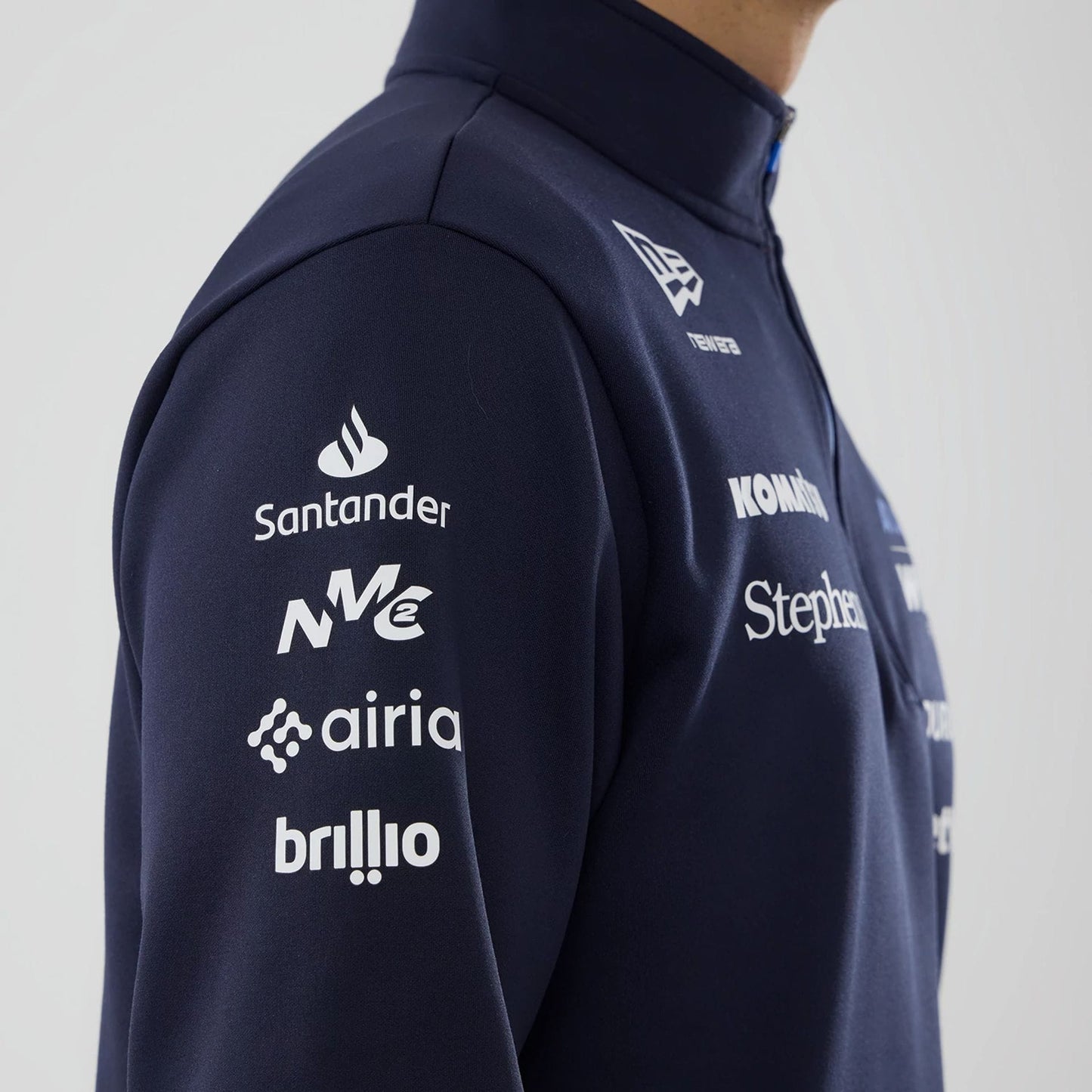 The model is wearing this Atlassian Williams F1 Team Mid Layer 1/4 Zip Sweatshirt in navy. 6