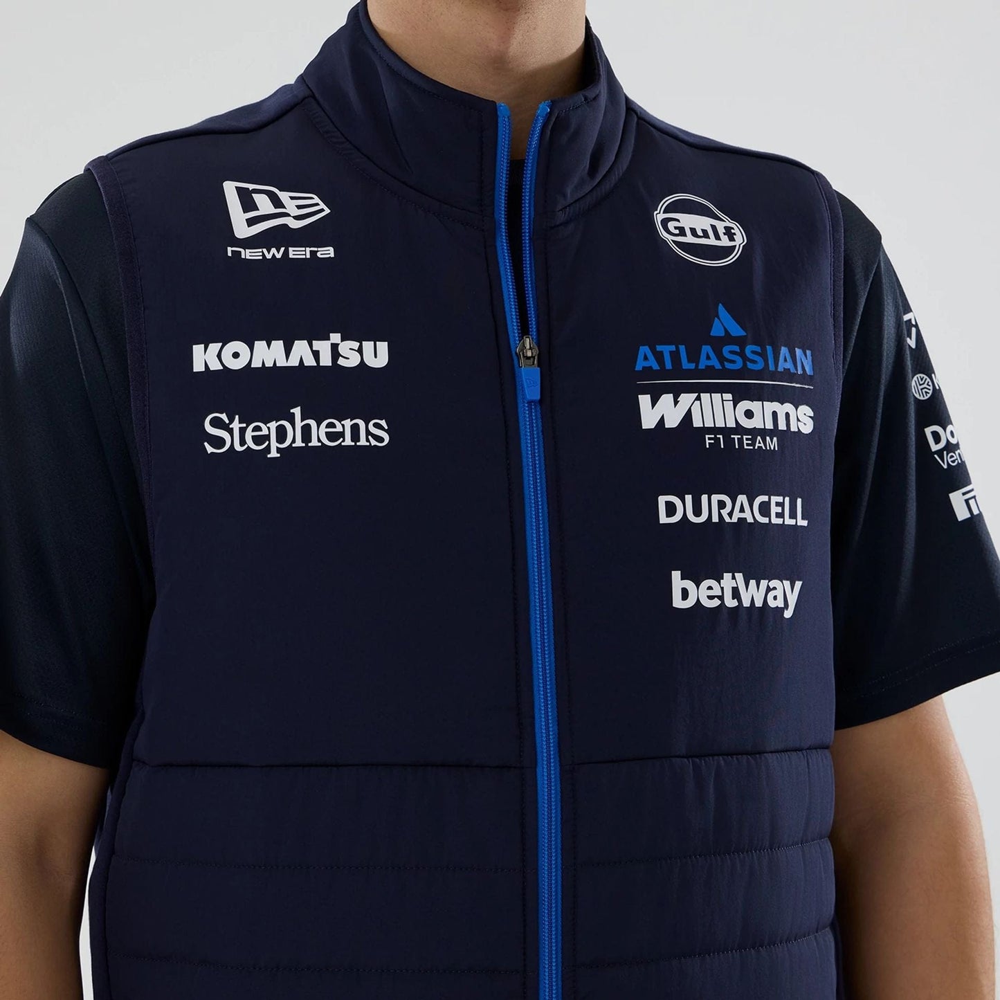 The model is wearing this Atlassian Williams F1 Team Gilet in navy. 3