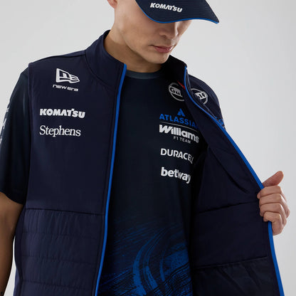 New Era Williams Navy Gilet, on-model view showing the open front revealing blue lining and branded T-shirt, with New Era and sponsor logos on the left chest, and a high neck collar.
