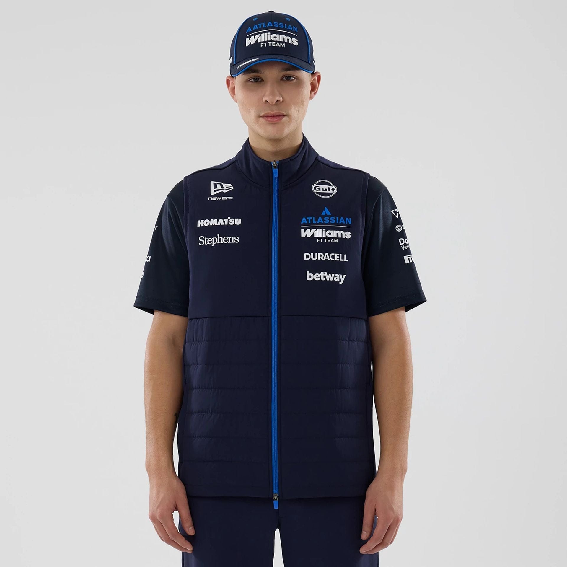 The model is wearing this Atlassian Williams F1 Team Gilet in navy. 1