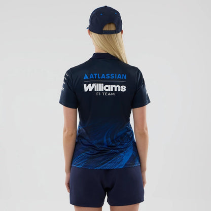 The model is wearing this Womens Atlassian Williams F1 Team Tech Polo T-shirt in navy. 2