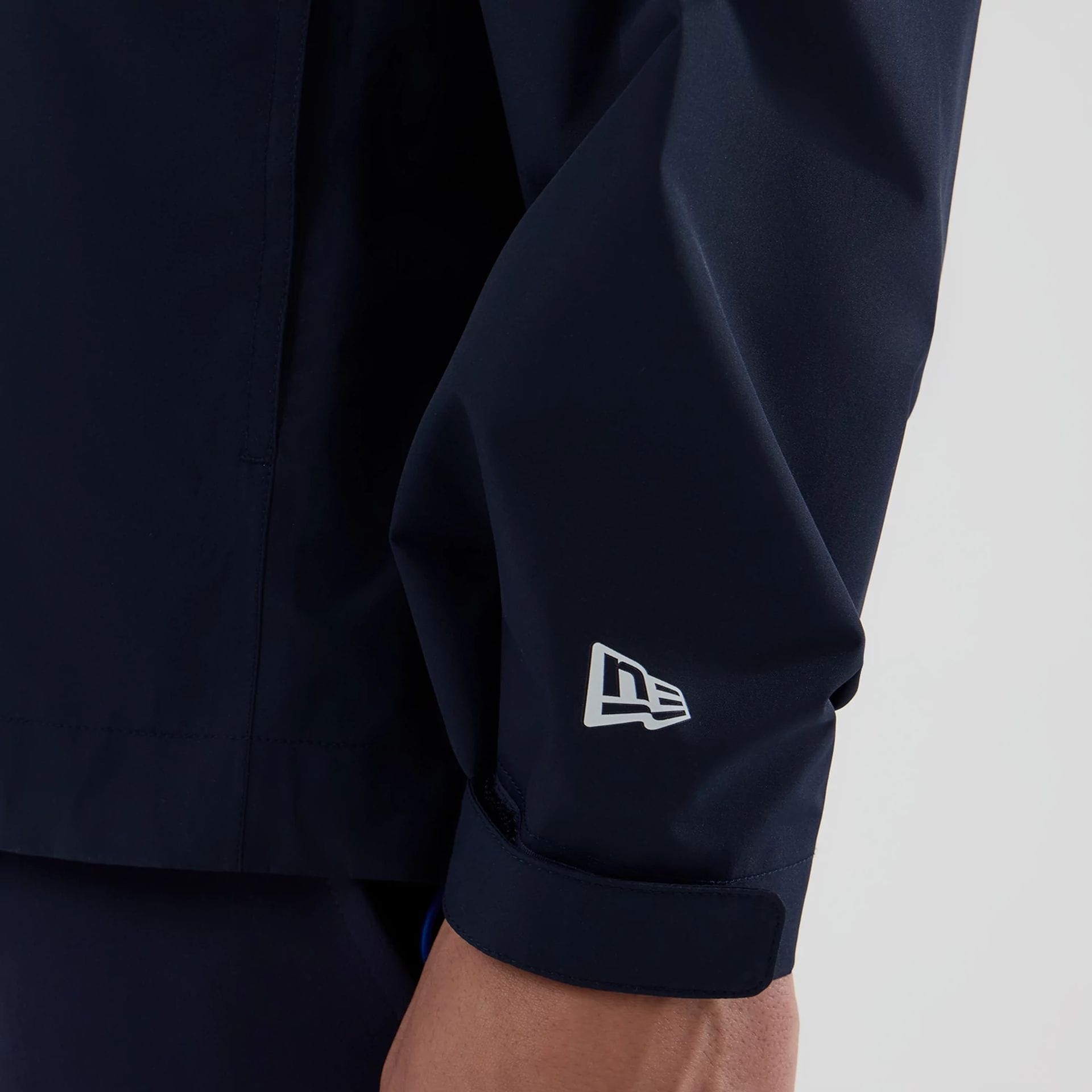 The model is wearing this Atlassian Williams F1 Team Rain Jacket in navy. 5