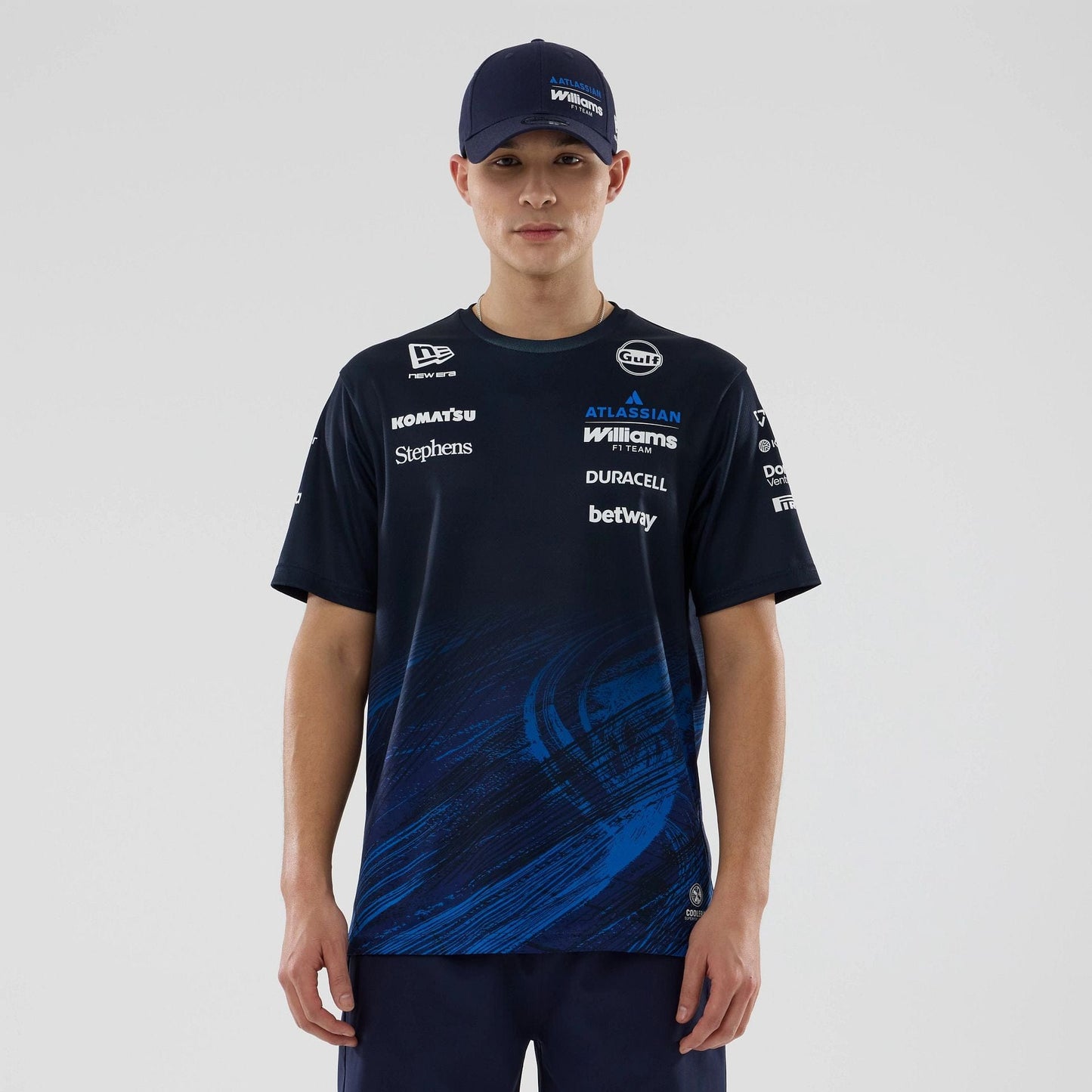 The model is wearing this Atlassian Williams F1 Team Tech T-shirt in navy. 1
