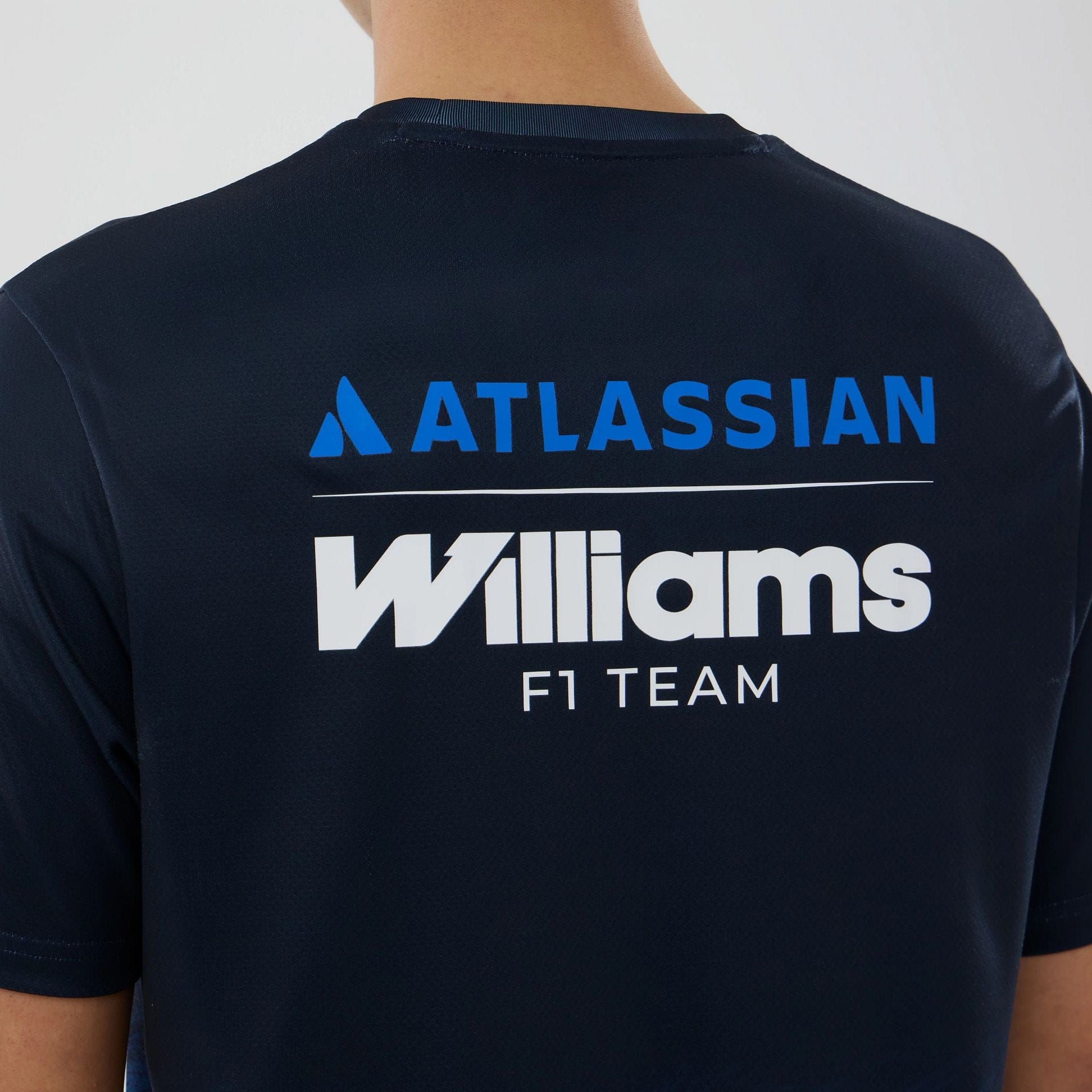 The model is wearing this Atlassian Williams F1 Team Tech T-shirt in navy. 7
