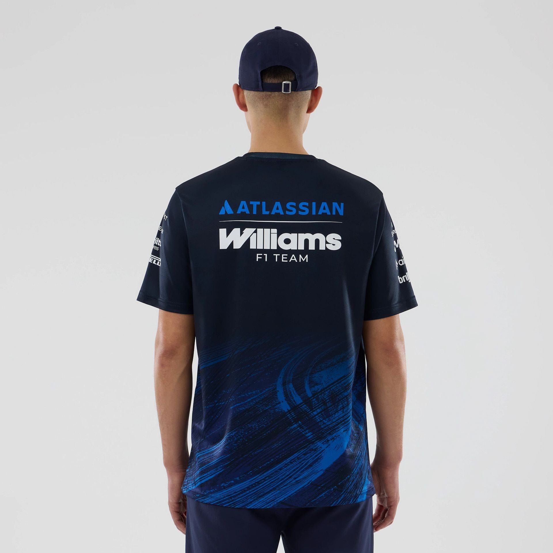 The model is wearing this Atlassian Williams F1 Team Tech T-shirt in navy. 2