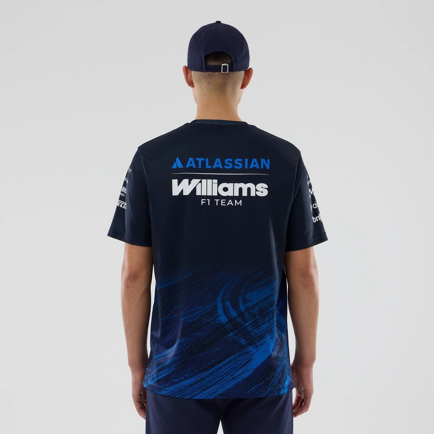 The model is wearing this Atlassian Williams F1 Team Tech T-shirt in navy. 2