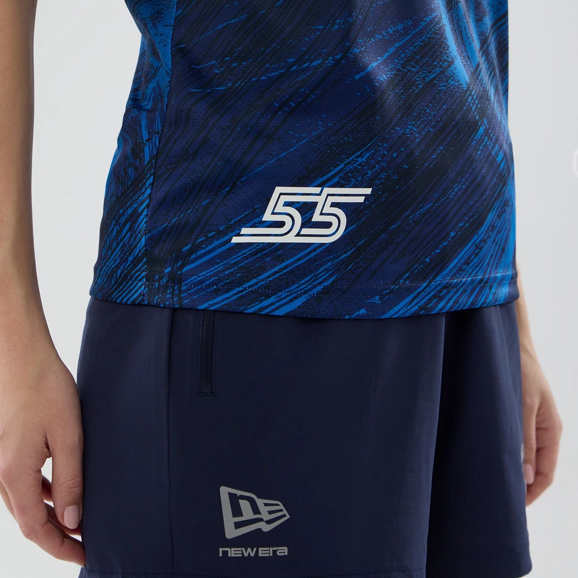 The model is wearing this Womens Carlos Sainz Atlassian Williams F1 Team Tech T-shirt in navy. 5