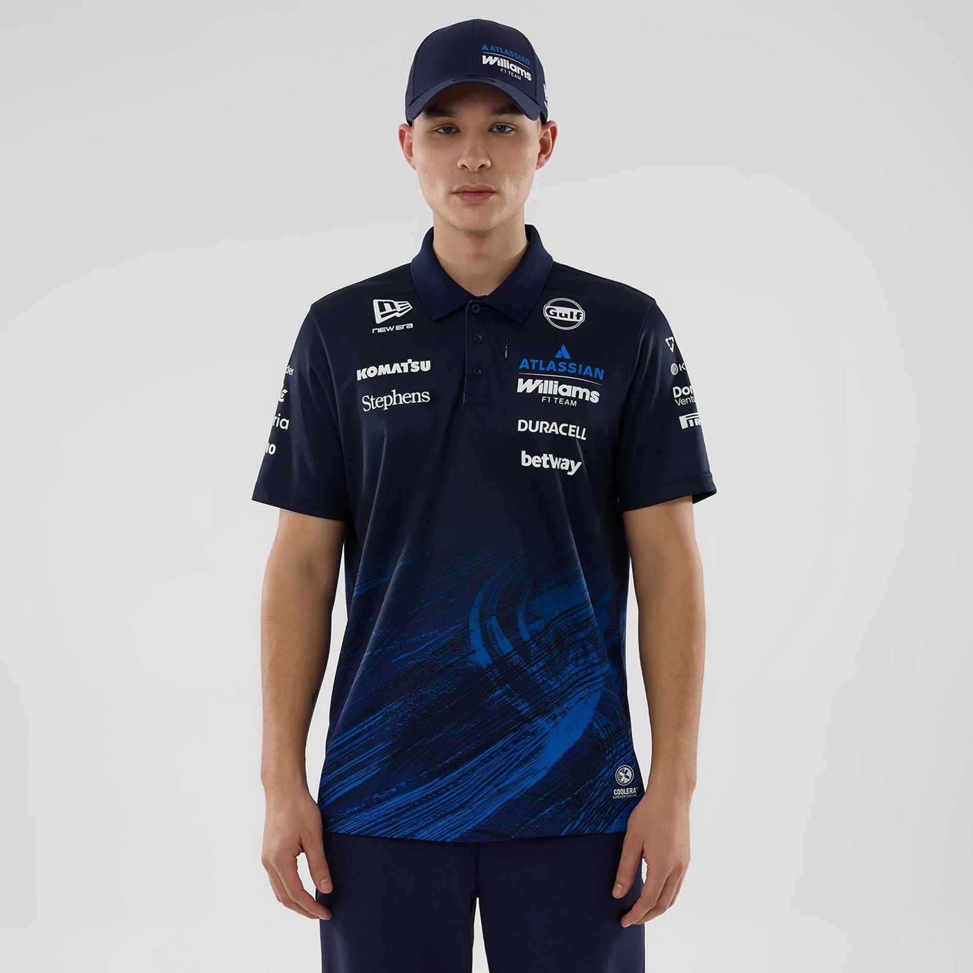 The model is wearing this Atlassian Williams F1 Team Tech Polo T-shirt in navy. 1