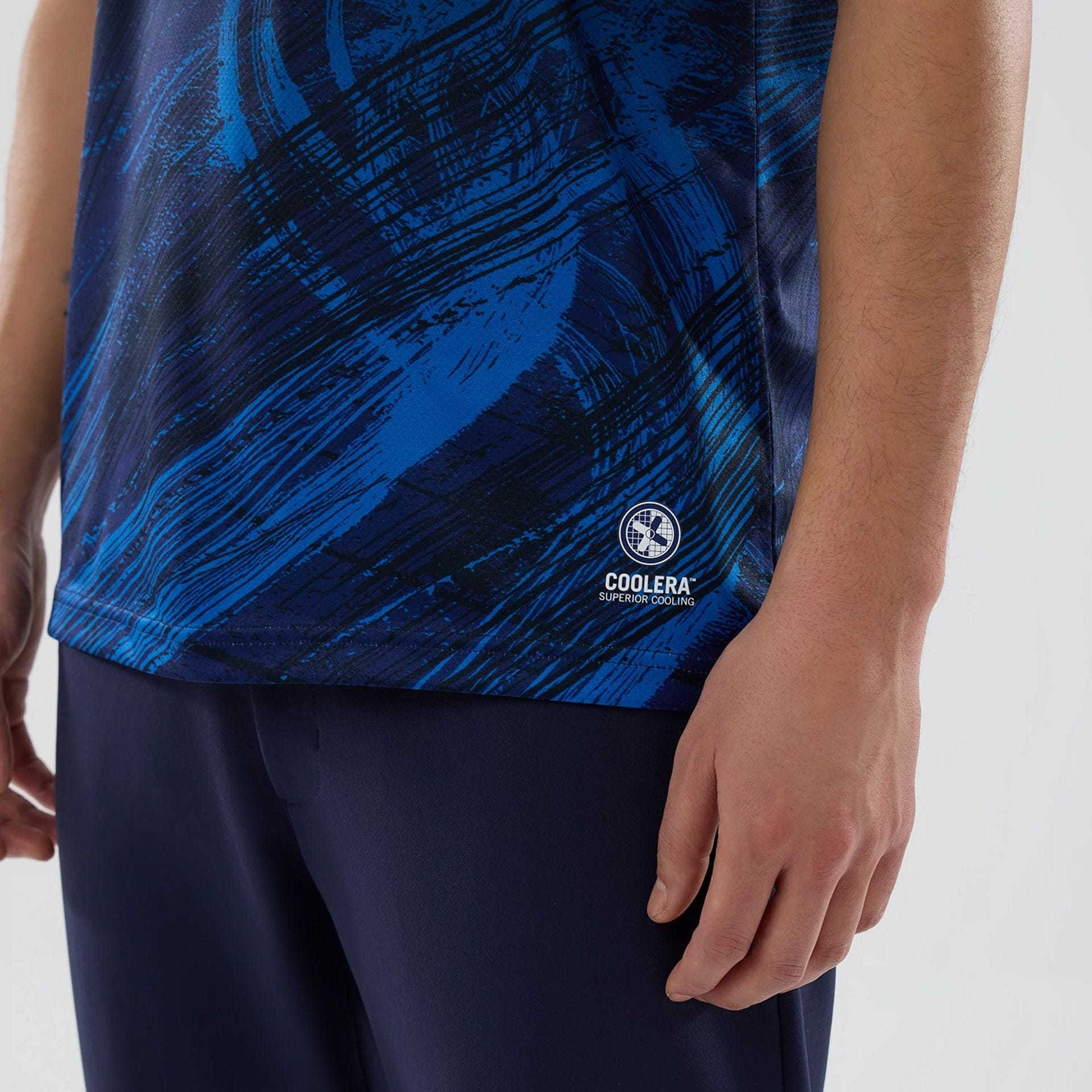 The model is wearing this Atlassian Williams F1 Team Tech Polo T-shirt in navy. 5