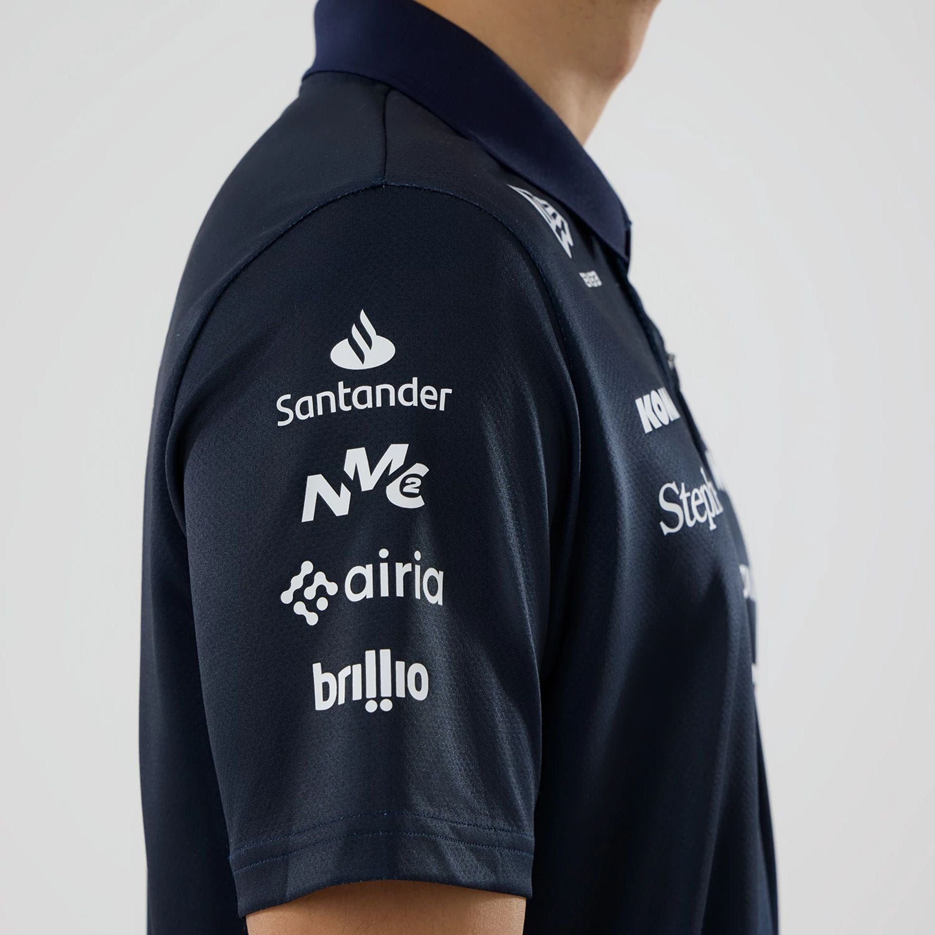 The model is wearing this Atlassian Williams F1 Team Tech Polo T-shirt in navy. 6