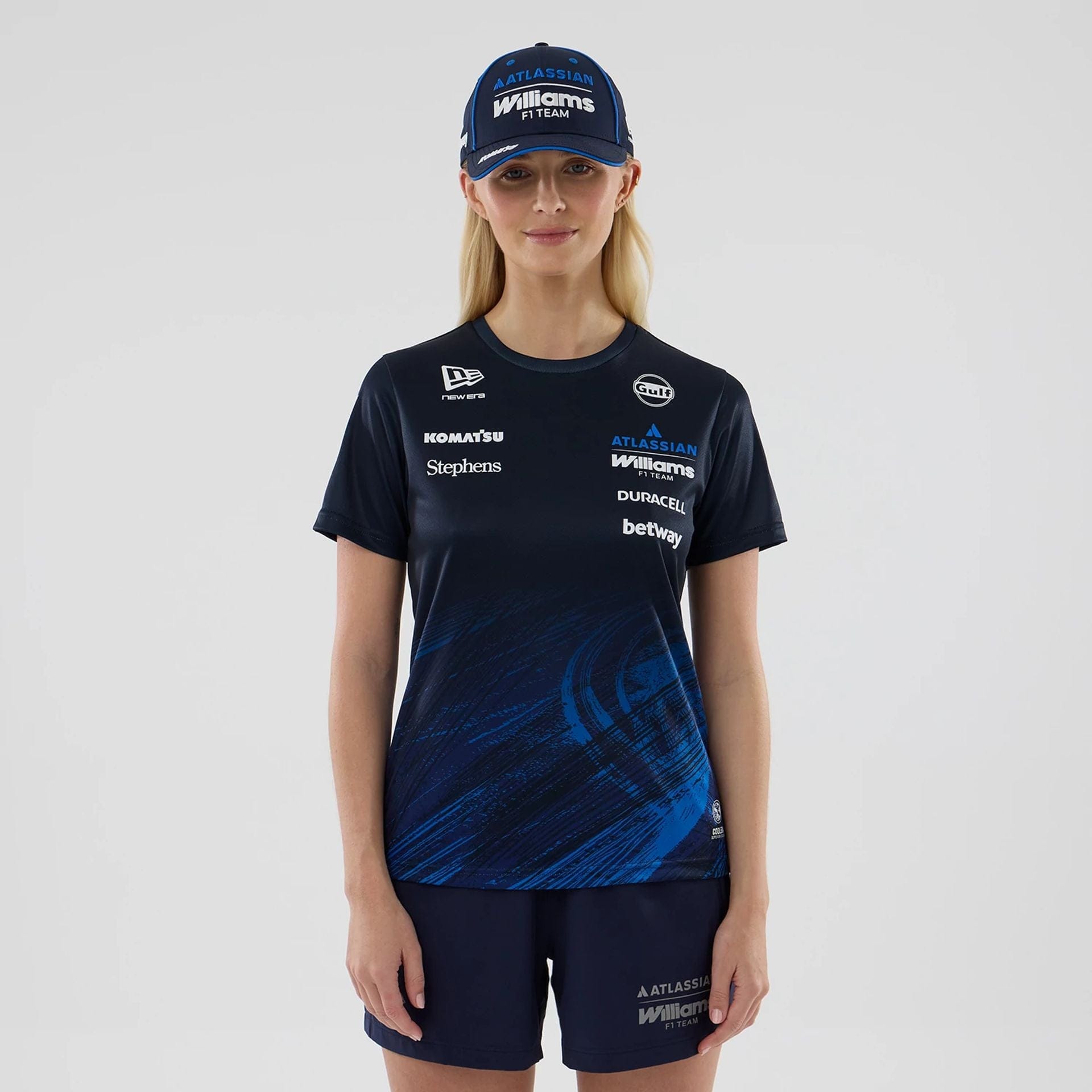 The model is wearing this Womens Atlassian Williams F1 Team Tech T-shirt in navy. 1