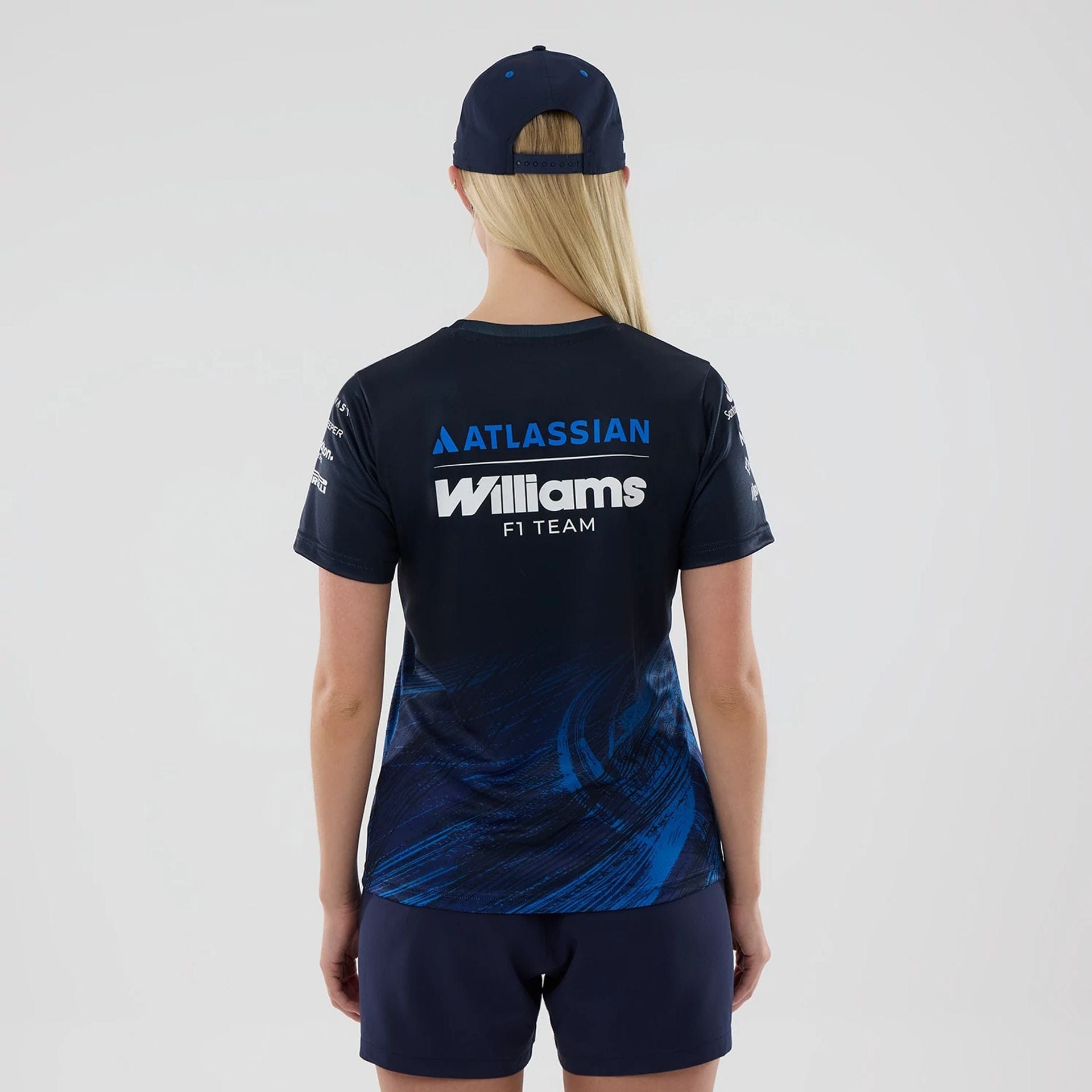 The model is wearing this Womens Atlassian Williams F1 Team Tech T-shirt in navy. 2