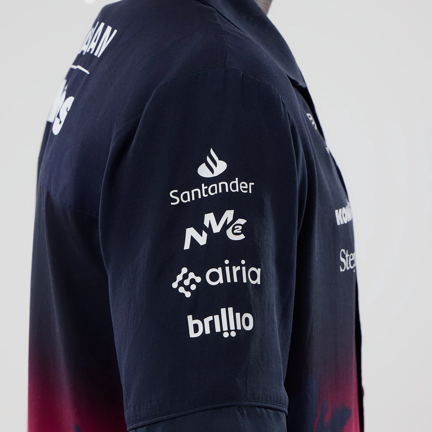 The model is wearing this Miami Atlassian Williams F1 Team Short Sleeve Shirt in navy. 4