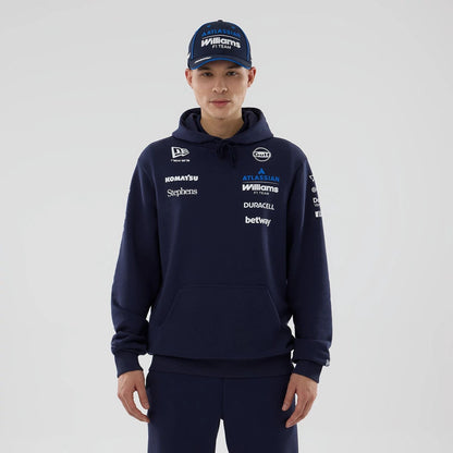 The model is wearing this Replica Atlassian Williams F1 Team Pullover Hoodie in navy. 1