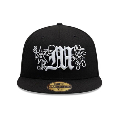 Pictured is this New Era X Mora All Over Characters 59FIFTY Fitted cap in black. 2