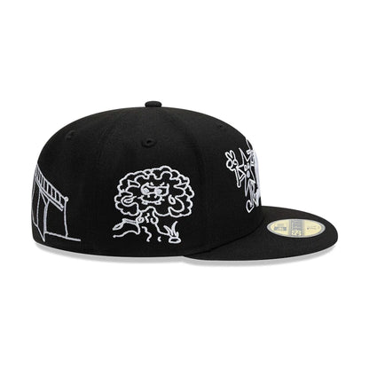 Pictured is this New Era X Mora All Over Characters 59FIFTY Fitted cap in black. 6