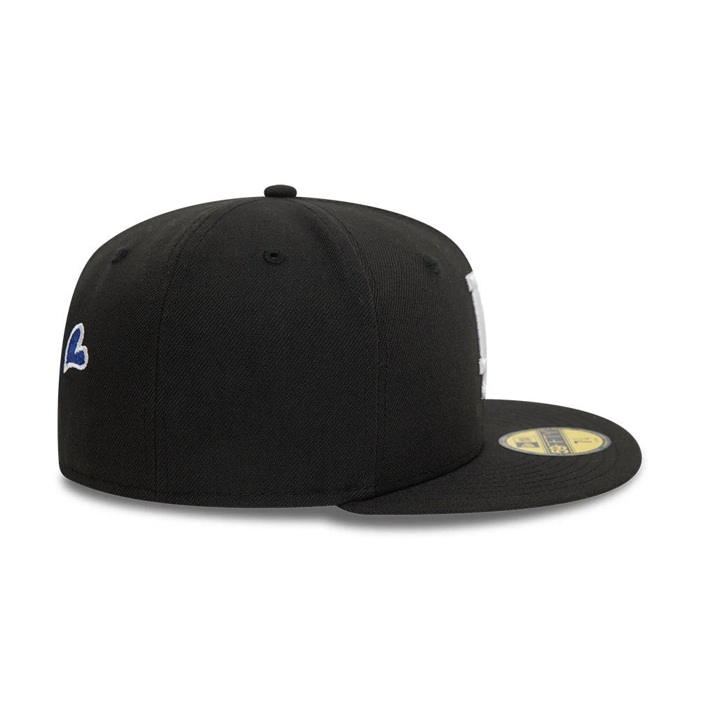 LA Dodgers MLB Heart Icon Black New Era 59FIFTY Fitted Cap, side view showing a blue heart-icon embroidered on the left side above the black structured crown, with a flat black visor and gold 59FIFTY size sticker on the top.