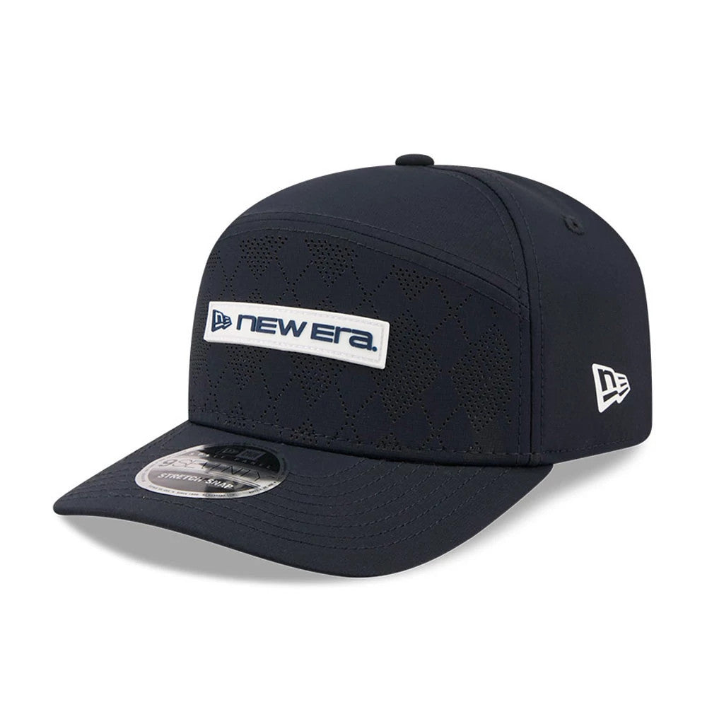 Pictured is this New Era Golf 9SEVENTY Split Panel Stretch Snap cap in navy. 1
