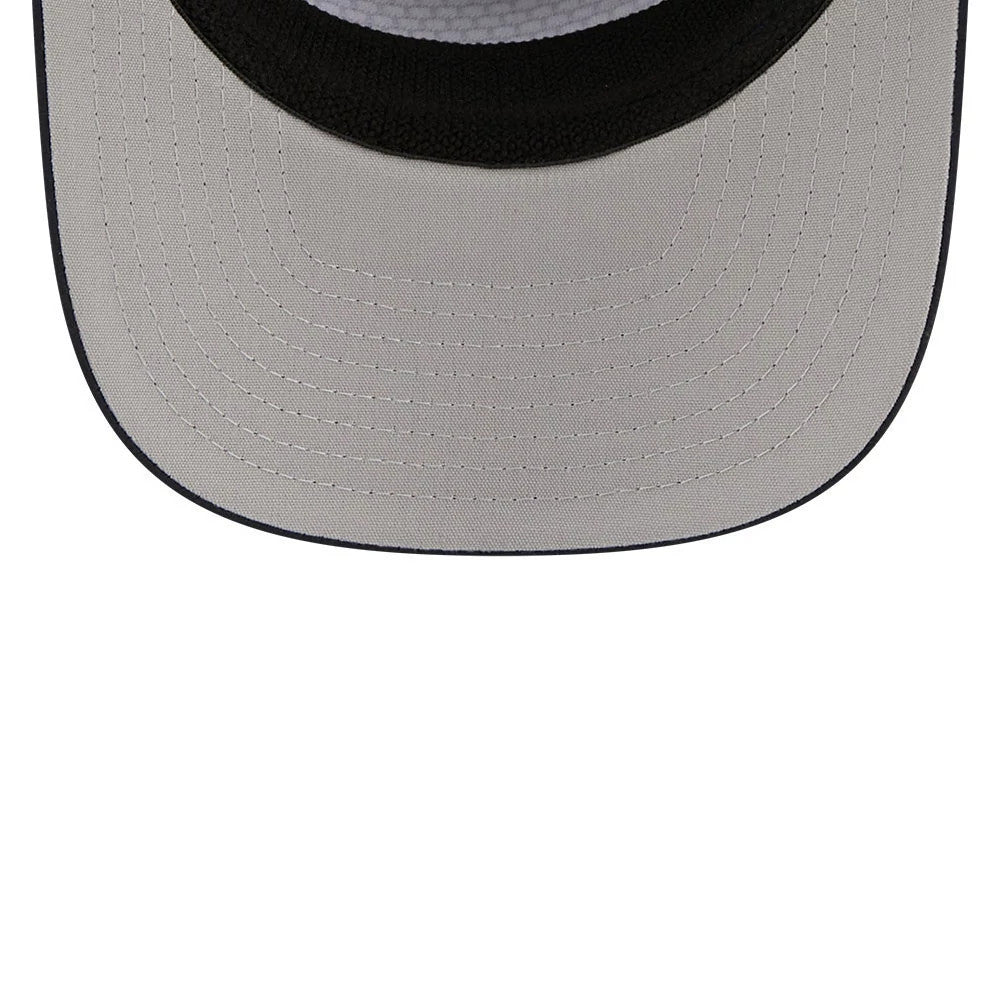 Pictured is this New Era Golf 9SEVENTY Split Panel Stretch Snap cap in navy. 2