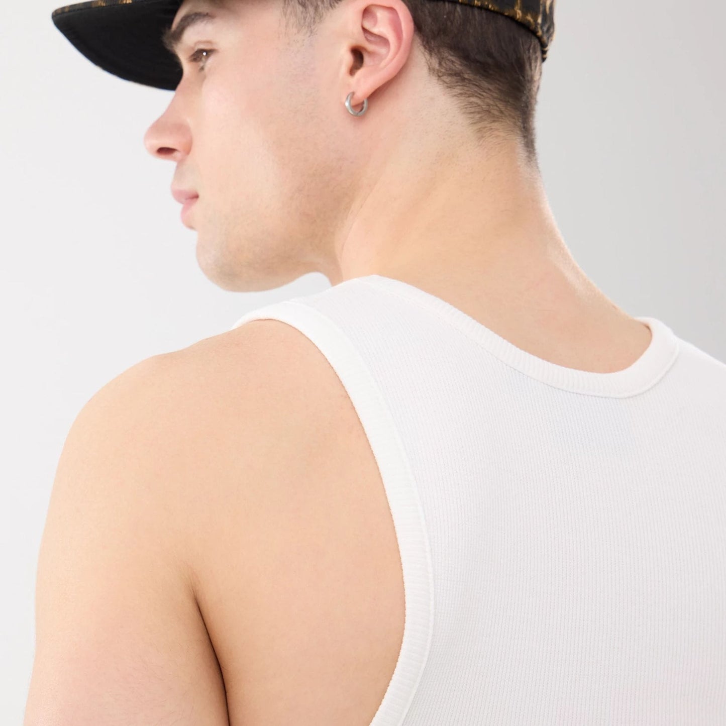The model is wearing this MLB Rib New York Yankees Vest in white. 7