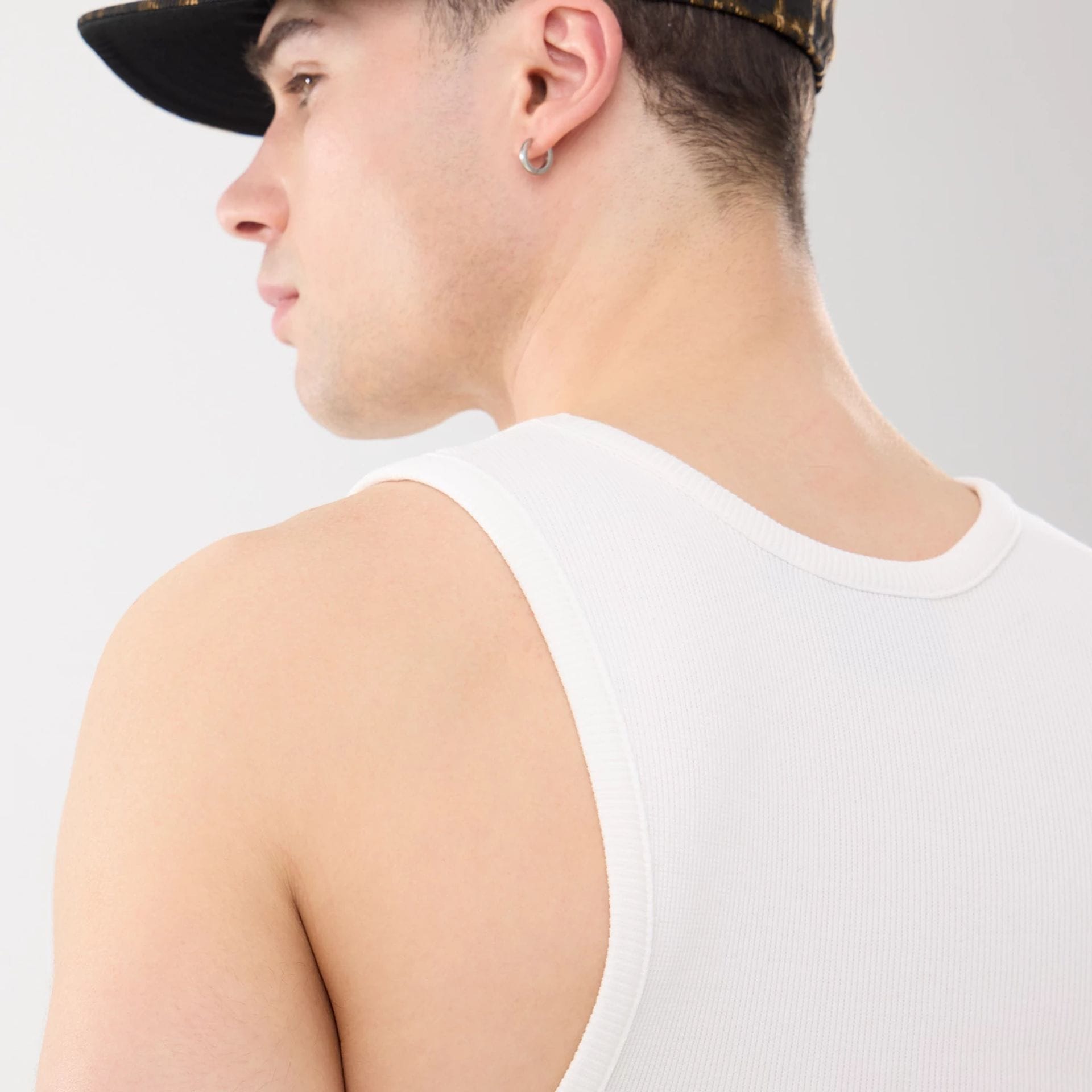 The model is wearing this MLB Rib New York Yankees Vest in white. 7