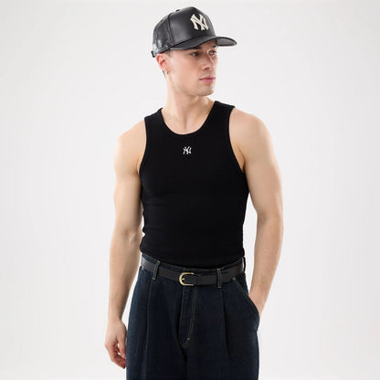 The model is wearing this MLB Rib New York Yankees Vest in black. 1